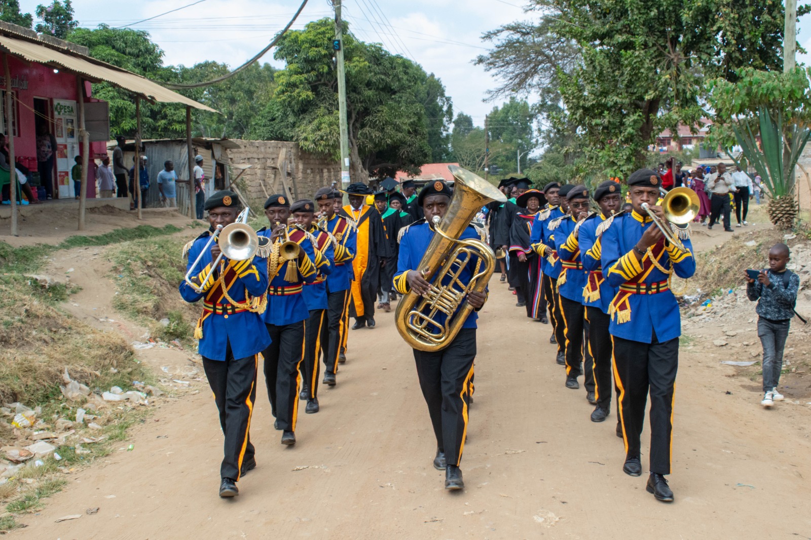 Band leading the graduation procession